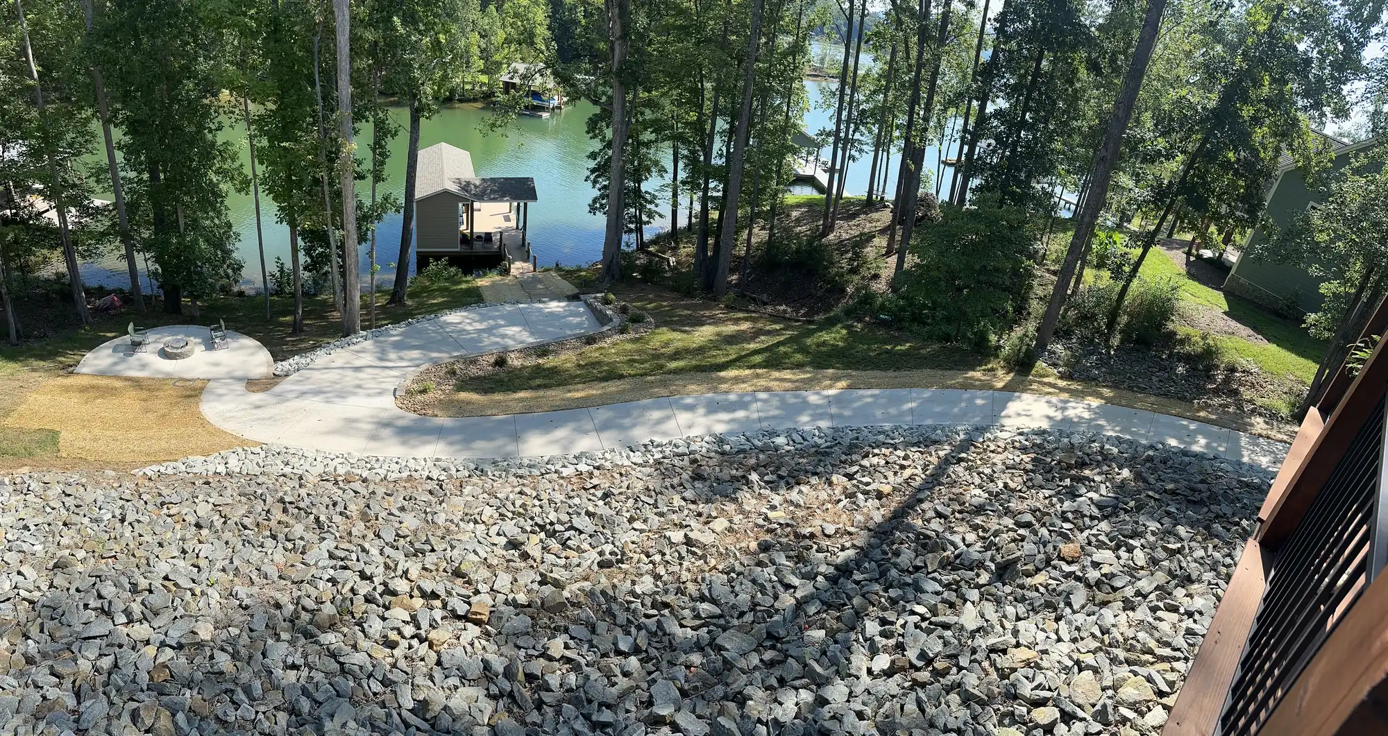 Erosion control with landscape fabric and stone at waterfront property