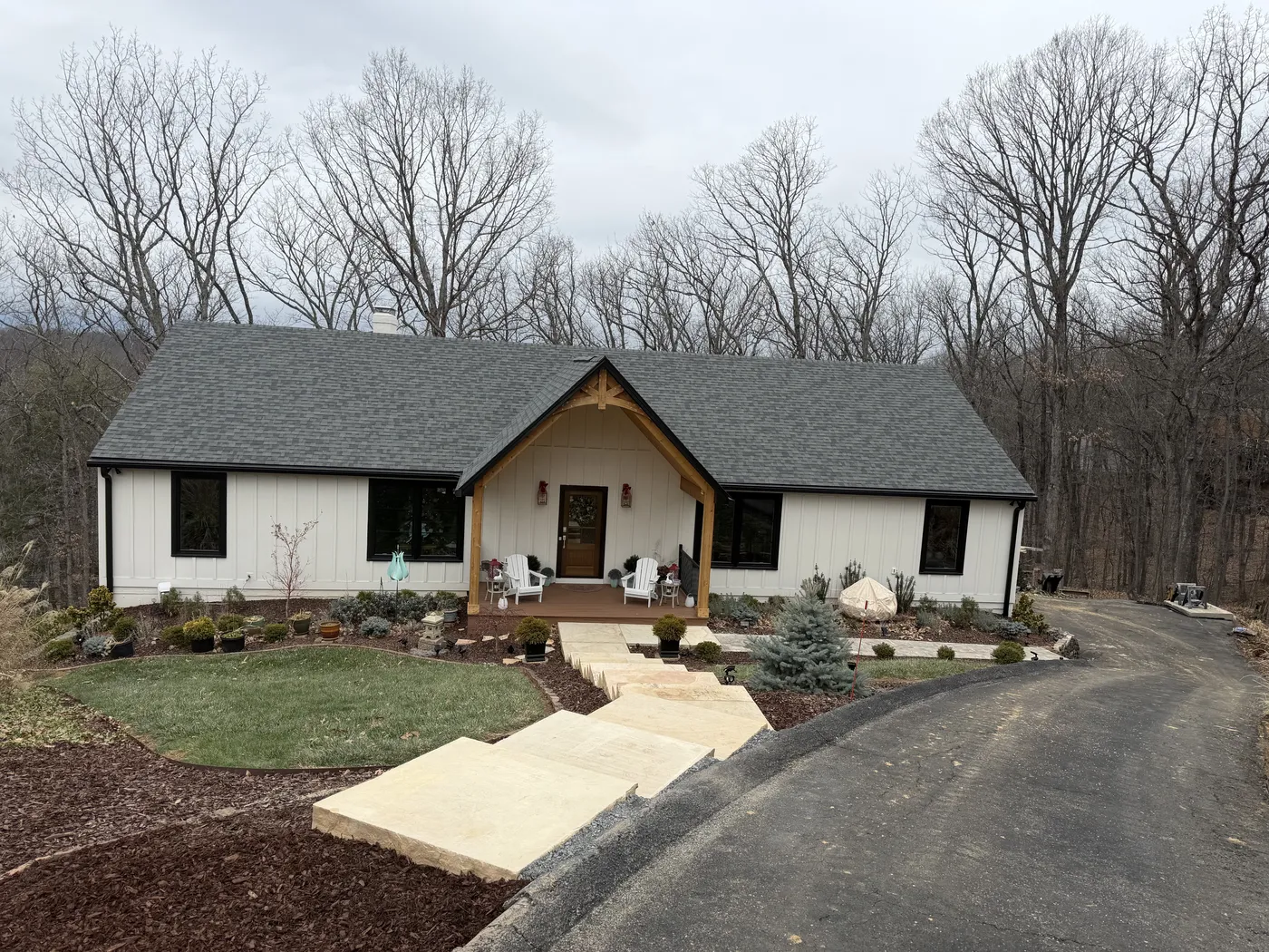Completed paver walkway, stone steps, and landscaping at residential property near Roanoke